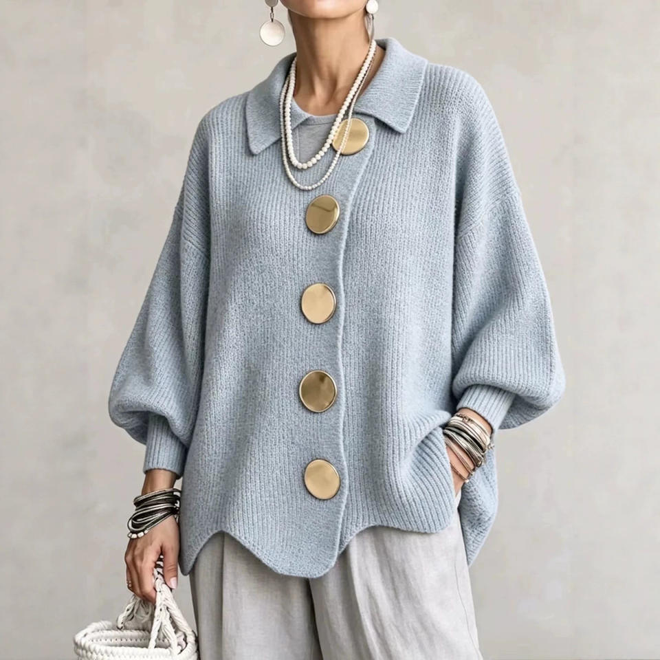 Sky blue cardigan showing the lapel collar and lantern sleeves